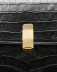 Leather top handle bag, black croc, lock close up