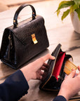 Tall leather zip around accordion coin purse, black croc, lifestyle