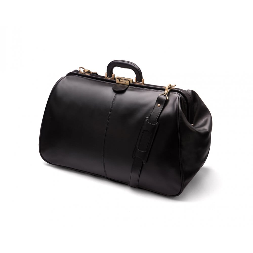 Leather Gladstone holdall, black, side view with shoulder strap