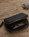 Small leather zip around coin purse, black, lifestyle
