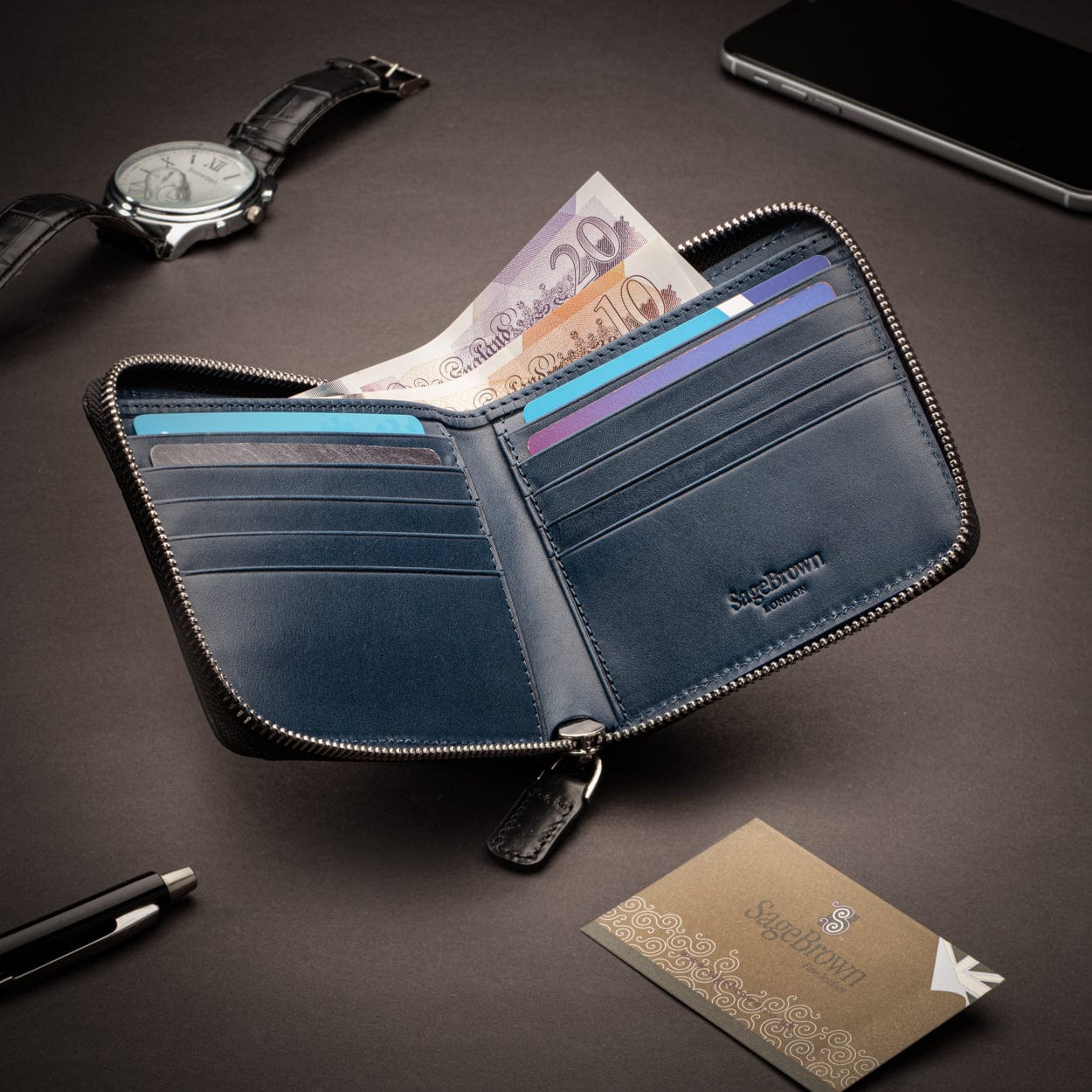 Men's leather wallet with zip around closure, black with cobalt, lifestyle