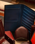 Slim tall leather suit wallet, black croc with cobalt, lifestyle
