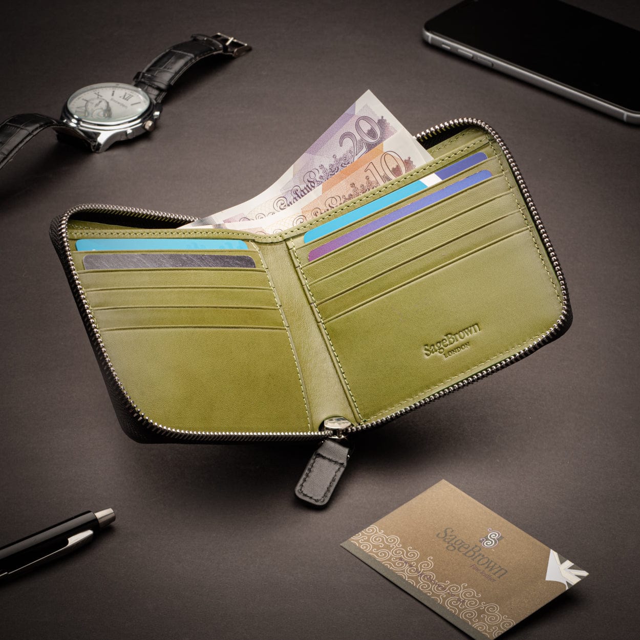 Men's leather wallet with zip around closure, black with lime, lifestyle