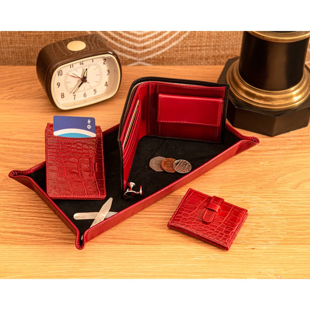 Leather wallet with coin purse, black with red, lifestyle
