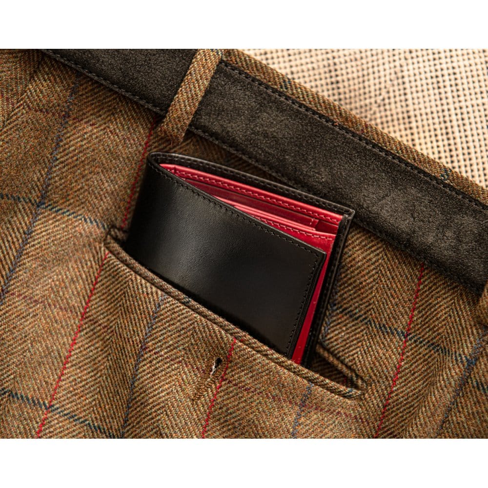 Leather wallet with coin purse, black with red, lifestyle