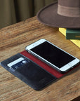 Leather iPhone 7 Plus and 8 Plus wallet case, black with red, lifestyle