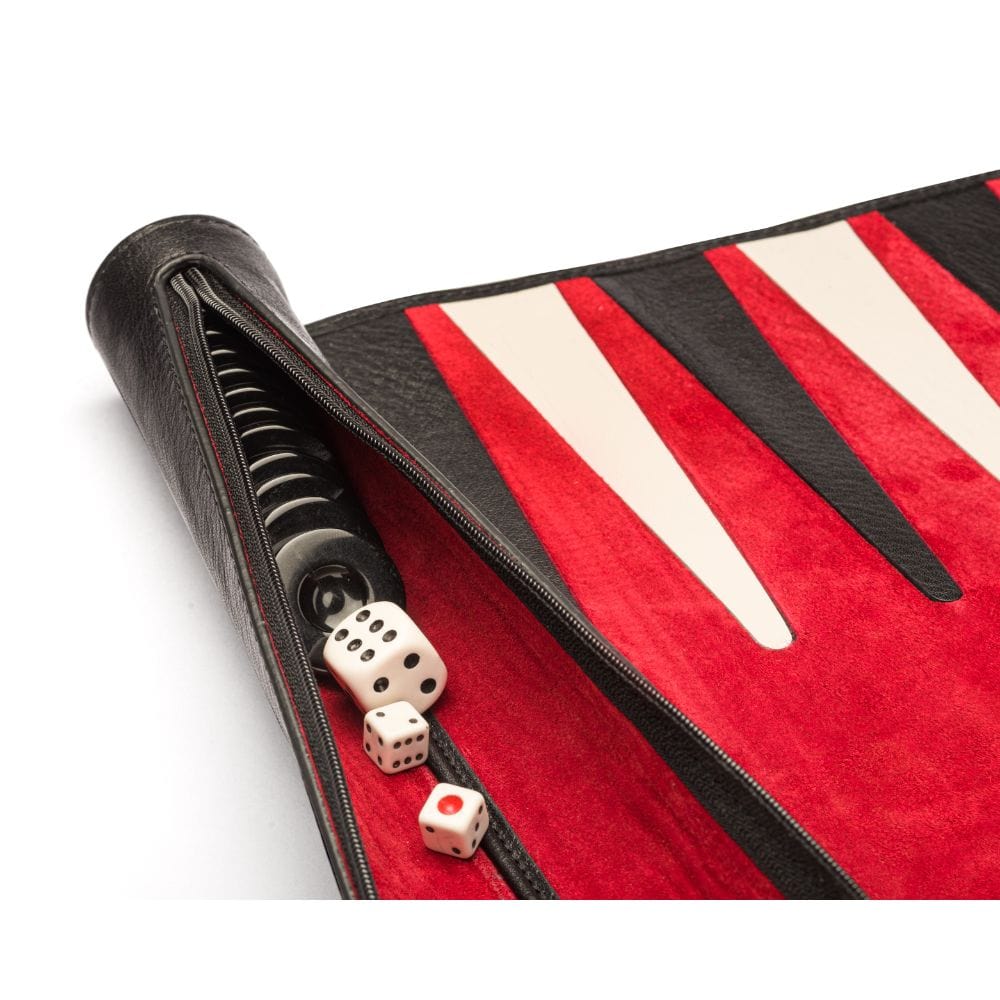 Leather backgammon roll, black with red, close up