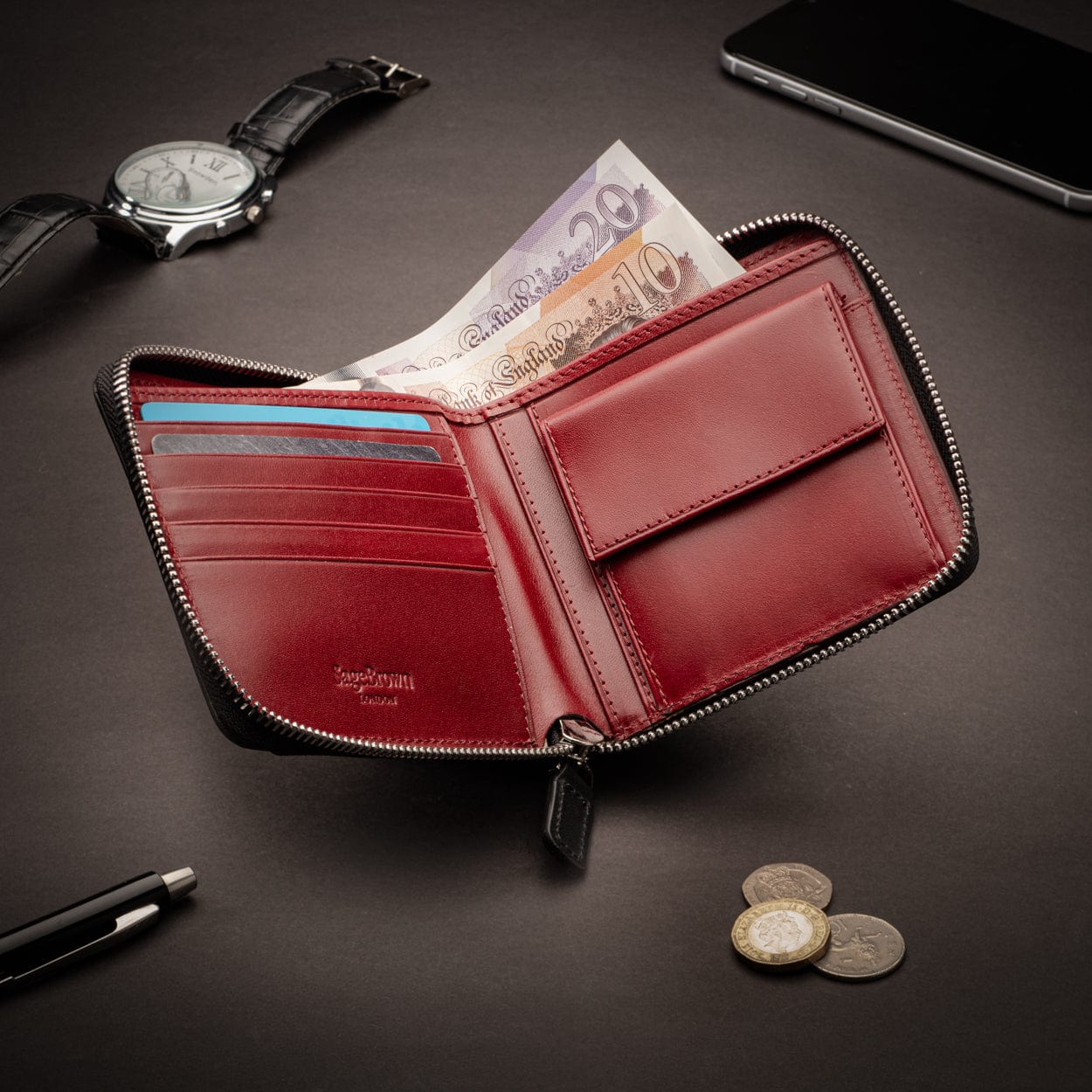Men's leather zip wallet with coin purse, black with red, lifestyle