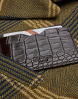 Flat leather credit card case with ID window, brown croc, lifestyle