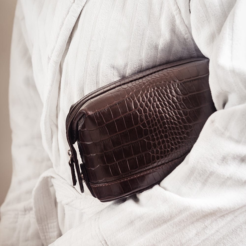 Leather wash bag, brown croc, lifestyle view