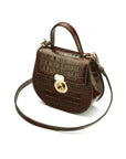 Leather rounded bottom top handle bag, brown croc, side
