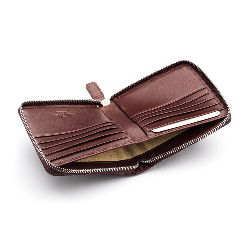 Men's leather wallet with zip around closure, brown, inside