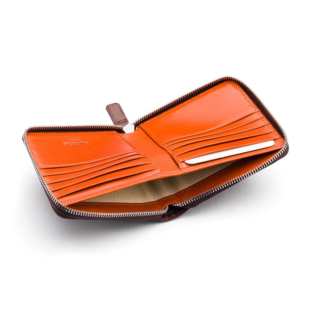 Men's leather wallet with zip around closure, brown with orange, inside