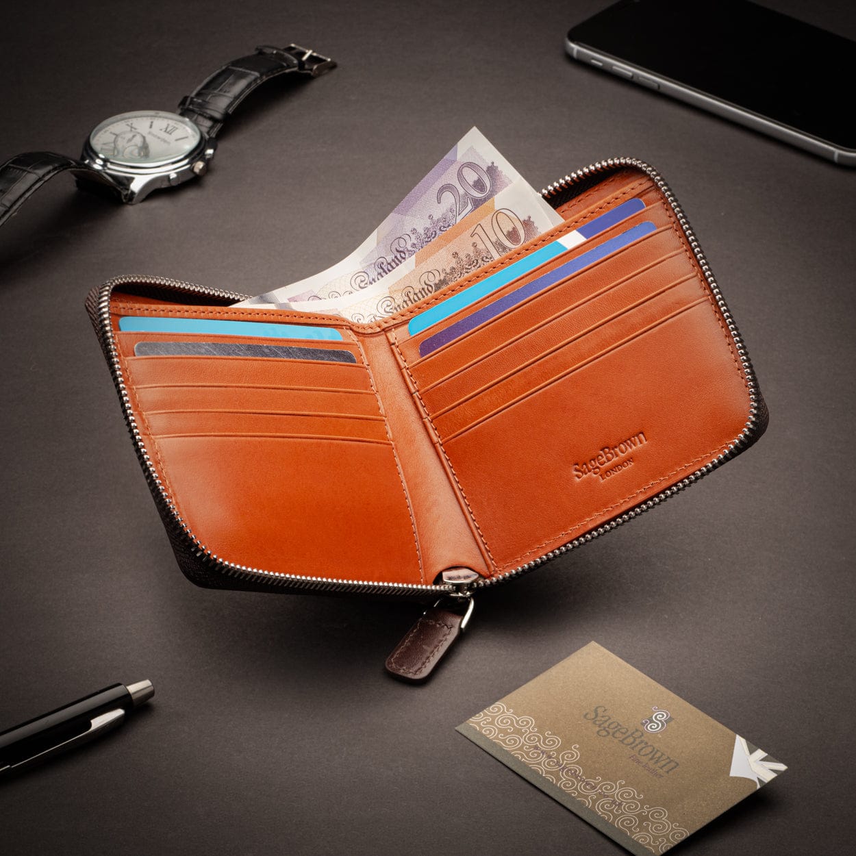 Men's leather wallet with zip around closure, brown with orange, lifestyle