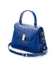Leather top handle bag, cobalt croc, side