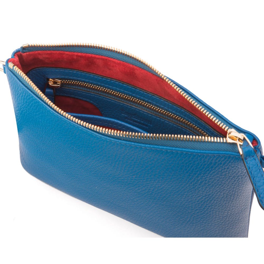 Leather cross body bag with chain strap, cobalt, inside