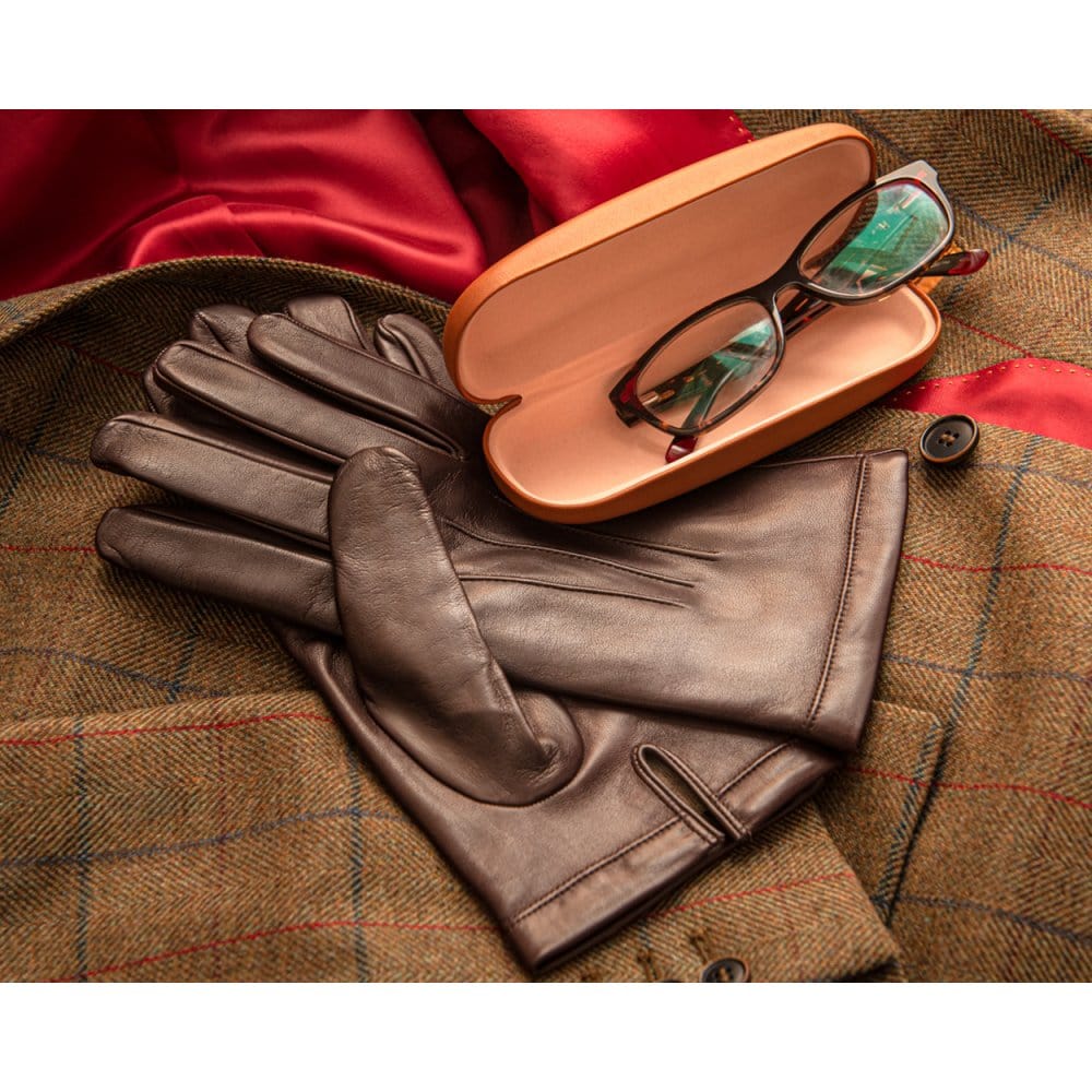 Hard rounded leather glasses case, dark tan, lifestyle