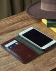 Leather iPhone 7 Plus and 8 Plus wallet case, dark tan, lifestyle