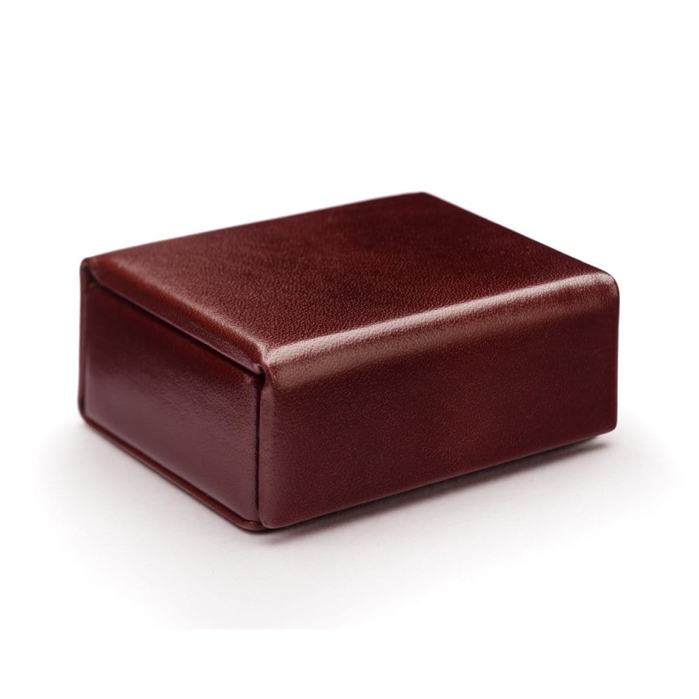 Small leather accessory box, dark tan with green, front