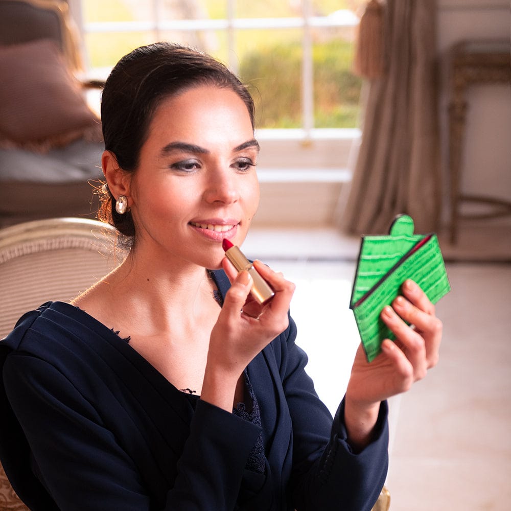 Compact leather mirror, emerald croc, lifestyle
