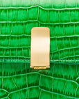 Leather top handle bag, emerald green croc, lock close up