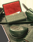 Leather horseshoe coin purse, green croc, lifestyle