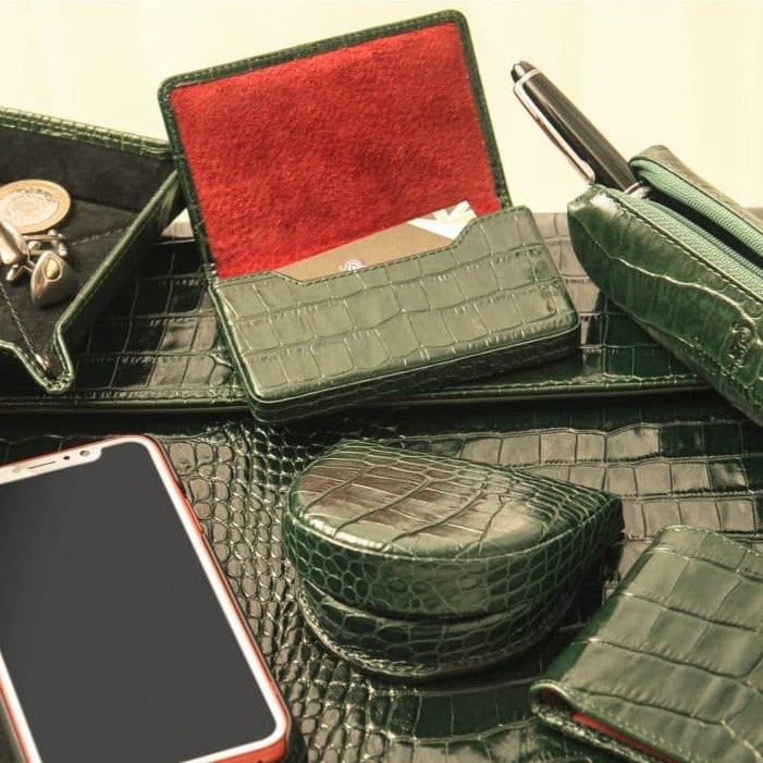 Leather business card holder with magnetic closure, green croc, lifestyle