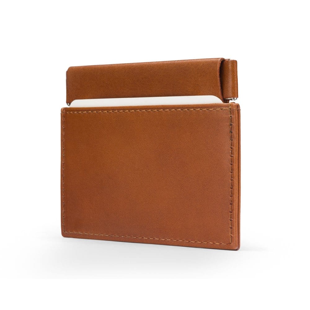 Leather squeeze spring coin purse, havana tan, side