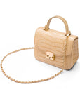 Small leather top handle bag, ivory croc, side