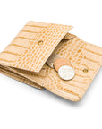 Leather purse with brass clasp, ivory croc, open