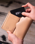 RFID blocking leather envelope purse, ivory, lifestyle view