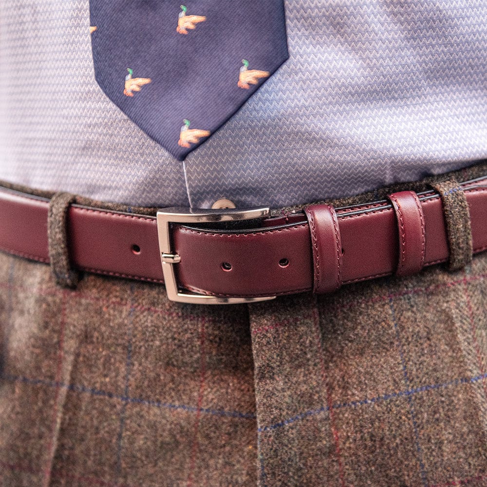 Leather belt with silver buckle, dark tan, lifestyle