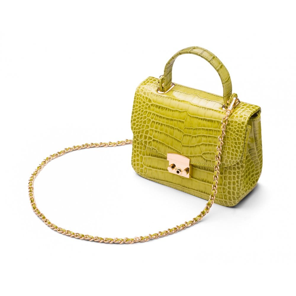 Small leather top handle bag, lime green croc, side