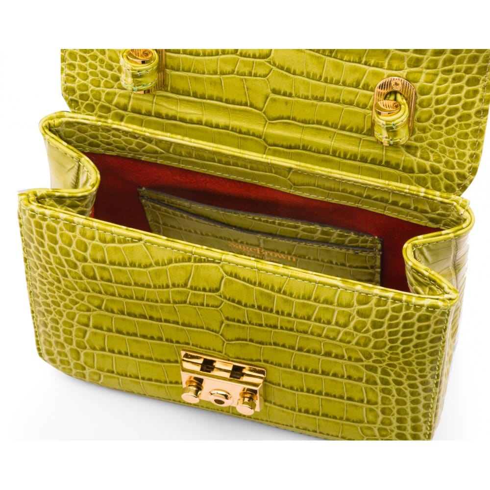 Small leather top handle bag, lime green croc, inside