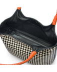 Woven leather shoulder bag, black and ecru check with orange handles, inside