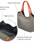 Woven leather shoulder bag, black and ecru check with orange handles, features