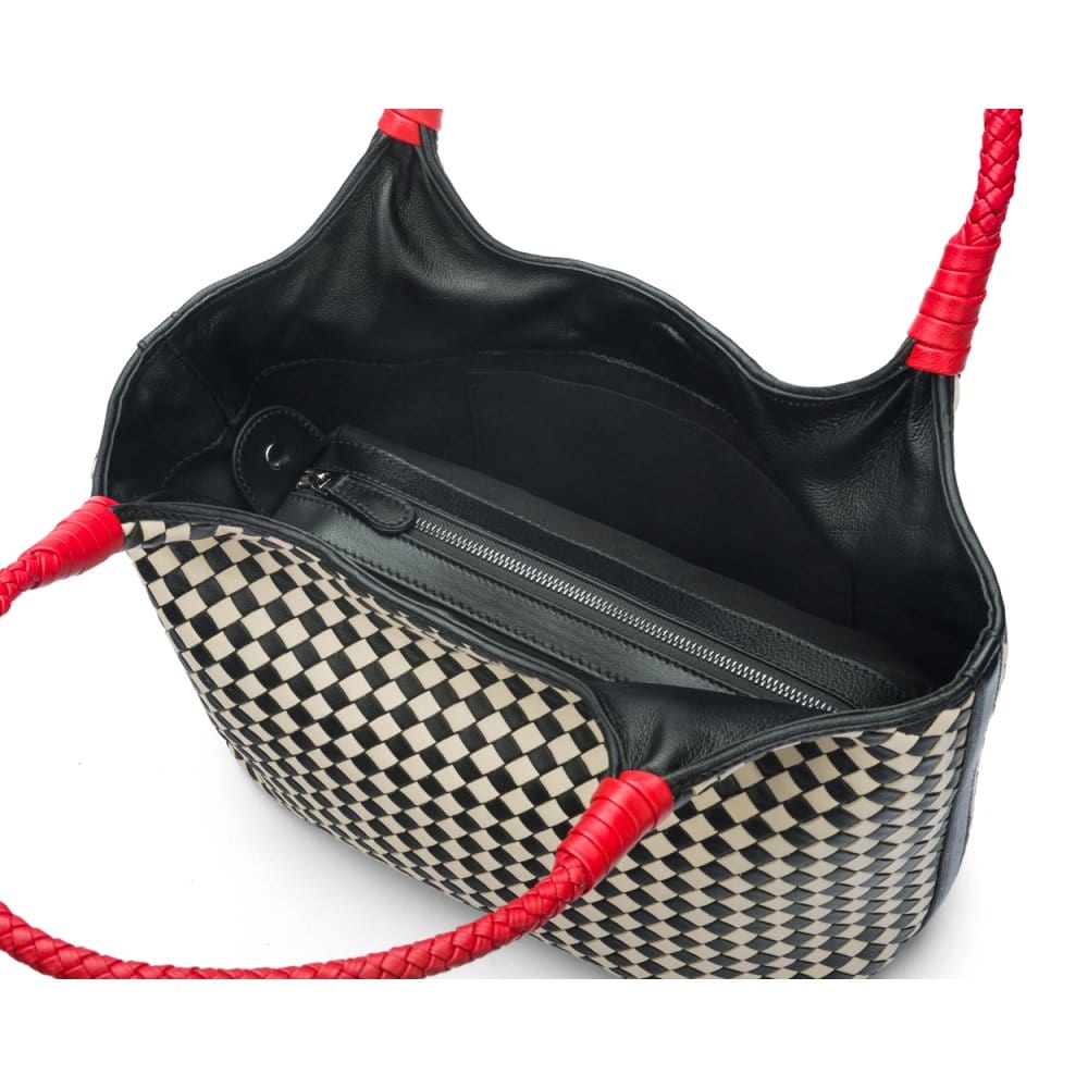 Woven leather shoulder bag, black and ecru check with red handles, inside