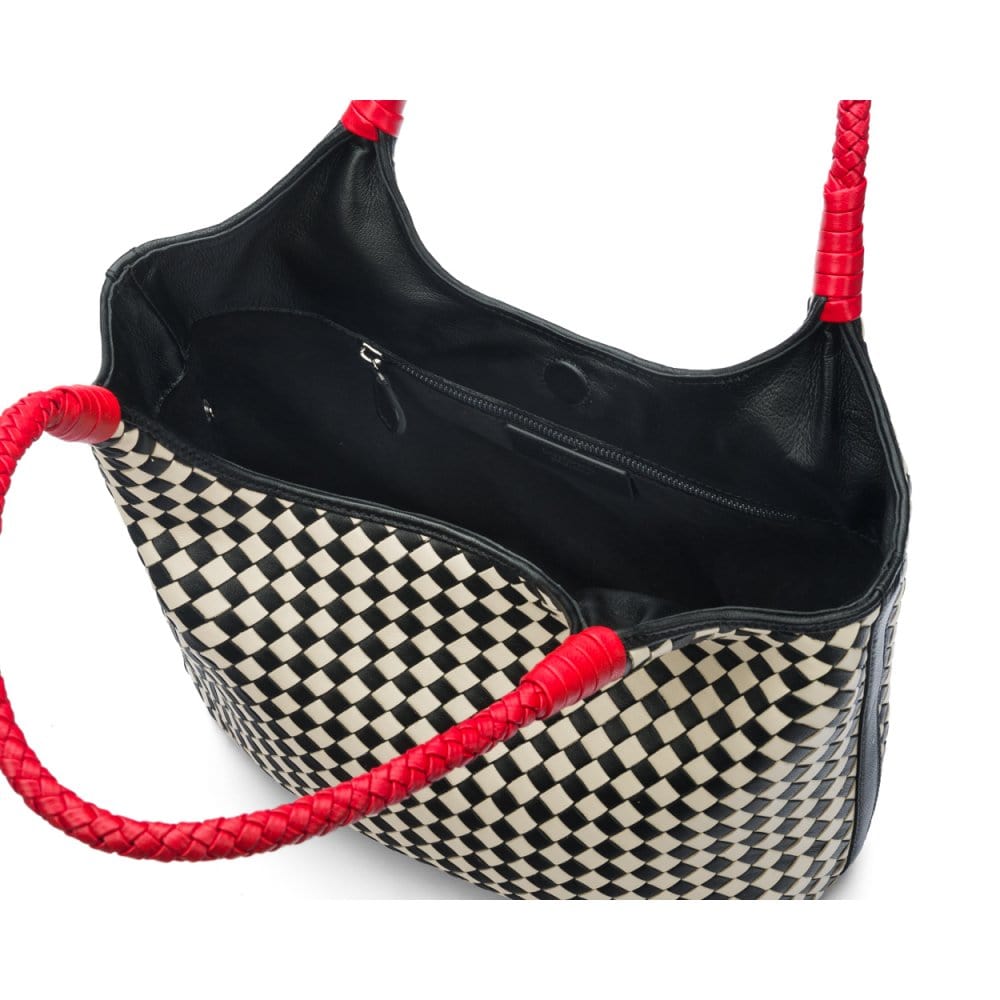 Woven leather shoulder bag, black and ecru check with red handles, open