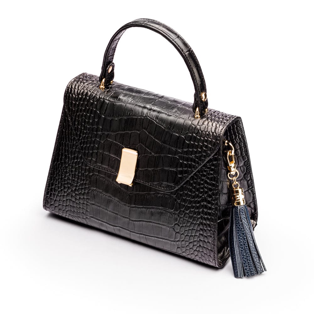 Decorative leather tassel, navy, on a bag