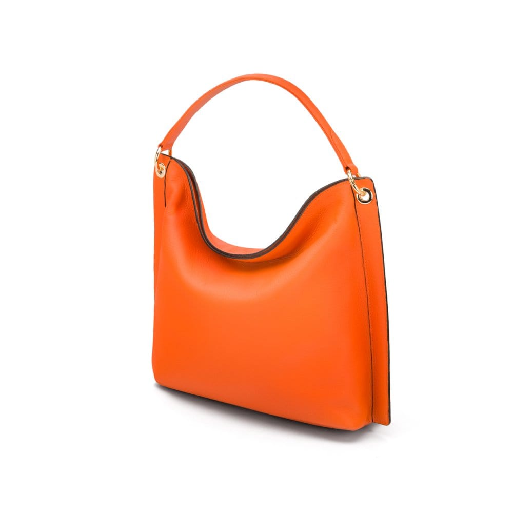 Carol Ann slouchy leather shoulder bag, orange, side