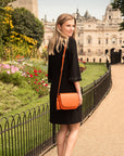 Leather shoulder bag, Clarice, orange pebble grain, lifestyle