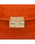 Small leather top handle bag, orange croc, lock close up