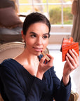 Compact leather mirror, orange croc, lifestyle
