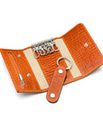 Key wallet with detachable key fob, orange croc, open