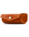 Leather lipstick case. orange croc, front