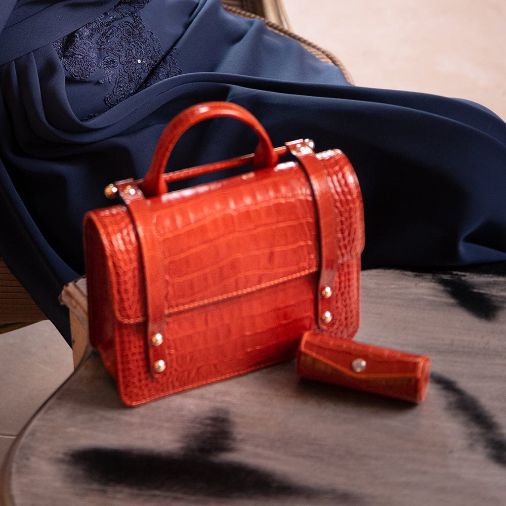 Leather lipstick case, orange croc, lifestyle