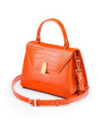 Leather top handle bag, orange croc, side view