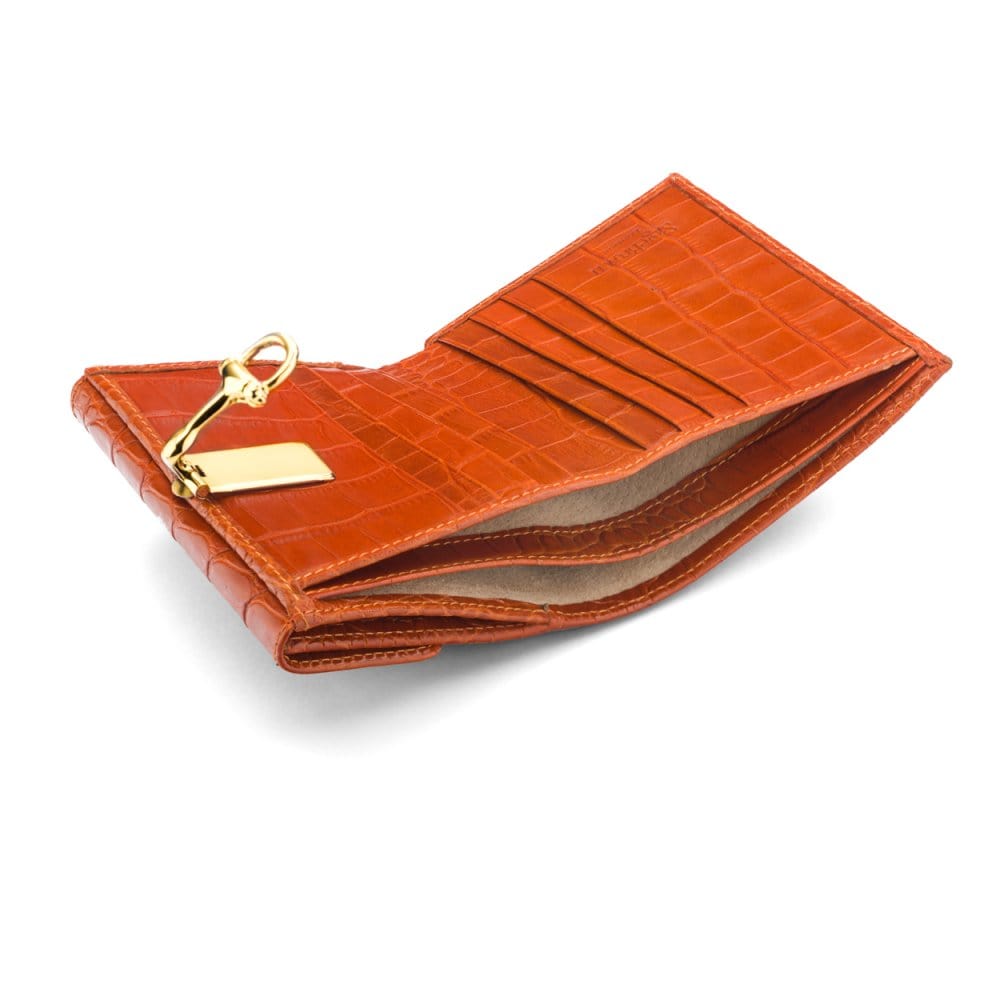 Leather purse with brass clasp, orange croc, inside