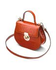 Leather rounded bottom top handle bag, orange croc, side