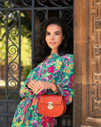 Top handle bag with rounded base, orange croc, lifestyle